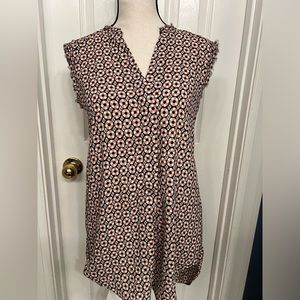 Women’s H&M sleeveless size 32 or size 2 blouse. Does run big.